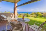 Huge grass area off lanai expands the feeling of spaciousness